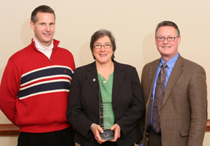 Photo of Mark Panek and Sue Mulvihill of MnDOT and Mike Kvach, Asphalt Pavement Alliance